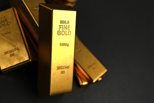 Berlin, Germany, December 24., 2019: Gold bars, 999 fine gold, 5 gram, as a safe investment, oblique view with low depth of field
