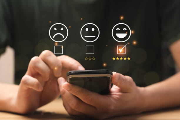 istock Customer satisfaction concept. Hands of business men using a mobile to comment 5 stars. Satisfaction Rating, good and impressive, after sales service. Excellent business rating, reputation 1406736657