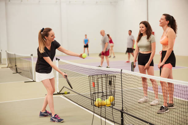 istock A sports teacher is teaching pickleball. 1406740134