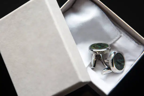 Elegant wedding cufflinks for a classic suit in the box.