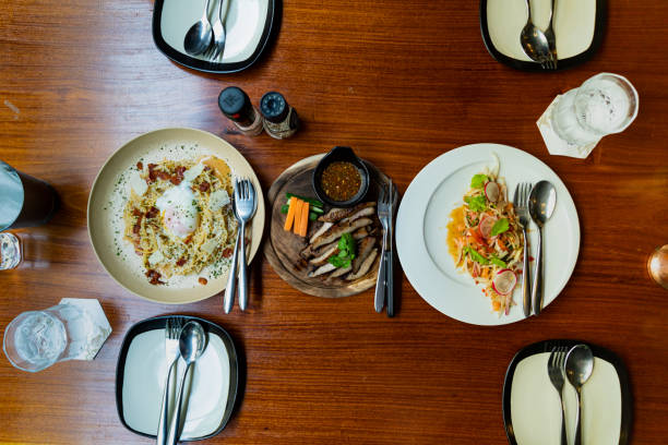 More food on wooden background with top view.