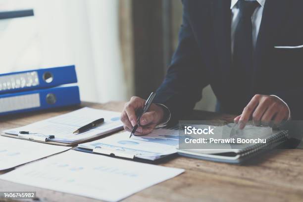 Businessman Analysis Marketing Plan Accountant Calculate Financial Report Accounting Calculating Cost Economic Financial Data Stock Photo - Download Image Now