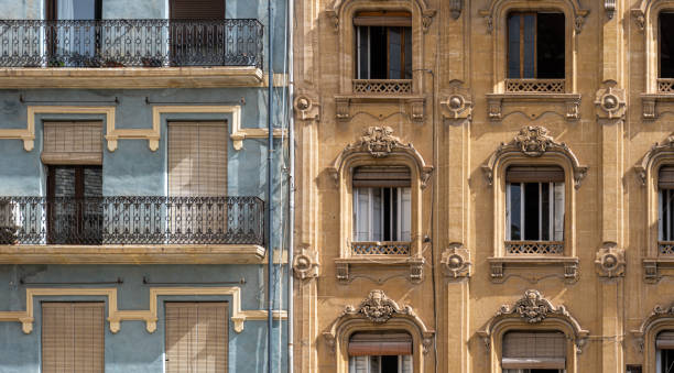 istock Aged facade of a 19th century building, with balconies 1406747937