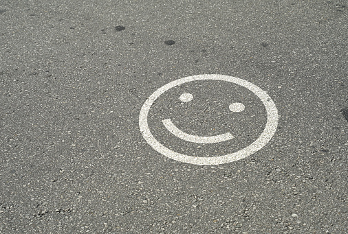a smiley display on the roadside
