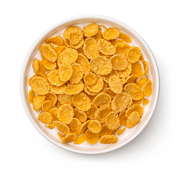 istock Corn flakes with milk isolated on white, top view 1406749695