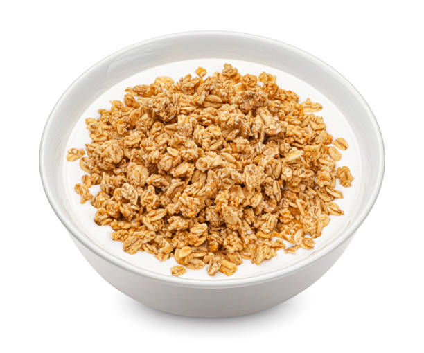istock Oat granola with milk isolated on white background 1406749786