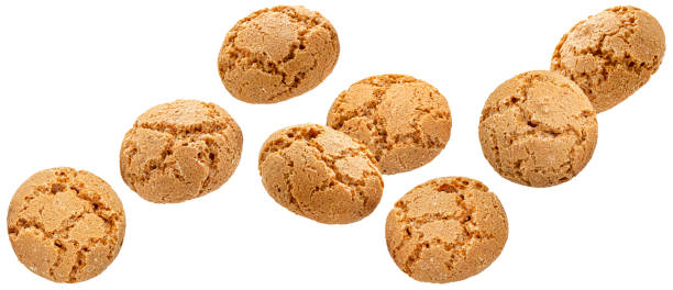 falling italian amaretti, almond cookies isolated - biscotti imagens e fotografias de stock