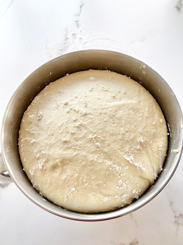 close-up of yeast dough in bowl