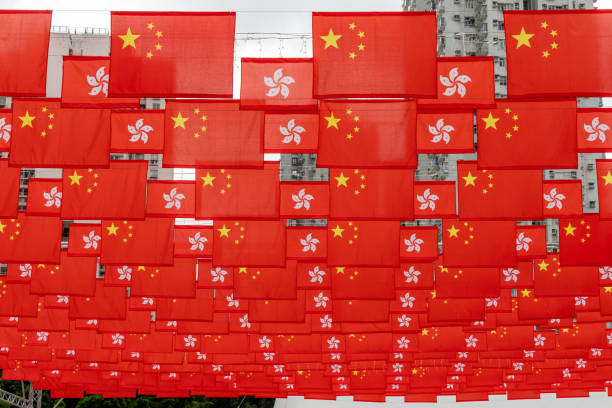 General view of flags of China and Hong Kong.