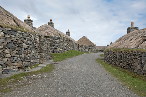 Isle of Lewis, Outer Hebrides, Scotland, United Kingdom - April 15, 2022: Exterior of Blackhouses at Gearrannan near Carloway