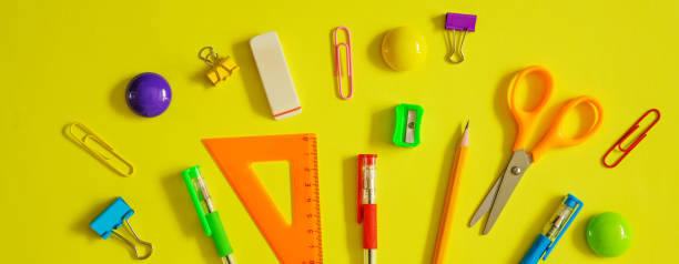 istock Tools for school creative work on a yellow background stationery, corondash pen 1406763389