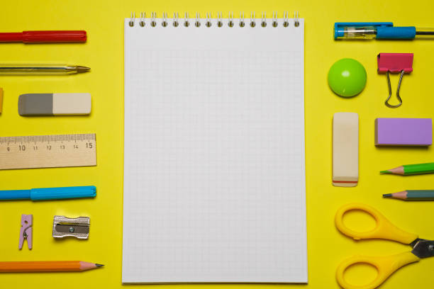 istock School notebook and various stationery. Back to school concept. Pencils pens 1406763538