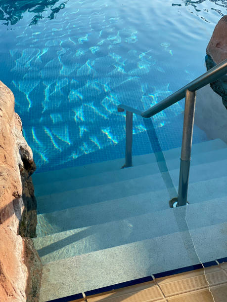 istock Swimming pool with stair 1406766325