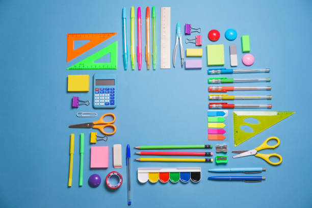 istock Calculator, stationery accessories on blue background with copy space. Look 1406766615