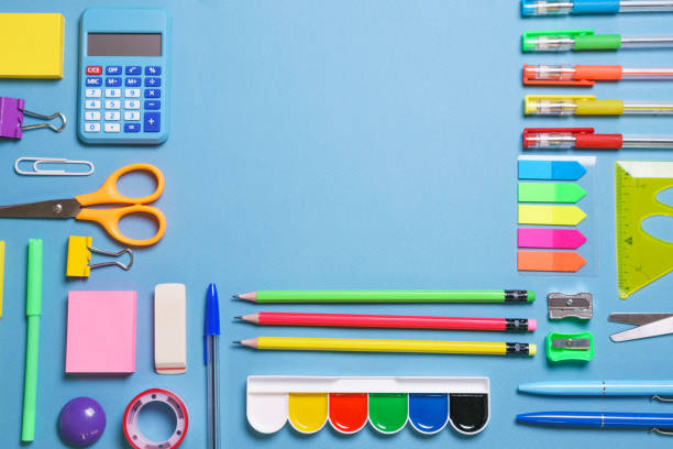 istock Frame with school supplies on a white background. Flat dip, top view. 1406766644
