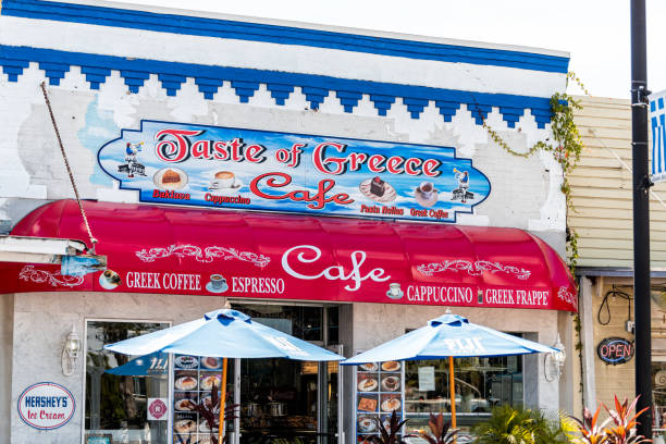 greek town in florida with dodecanese boulevard road street and sign for famous taste of greece restaurant cafe serving coffee - photography starbucks flag sign imagens e fotografias de stock