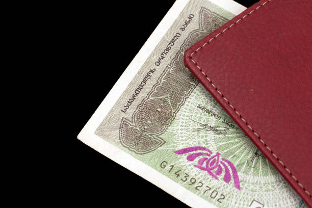 istock Notebook with Georgian banknotes on a black background 1406770105