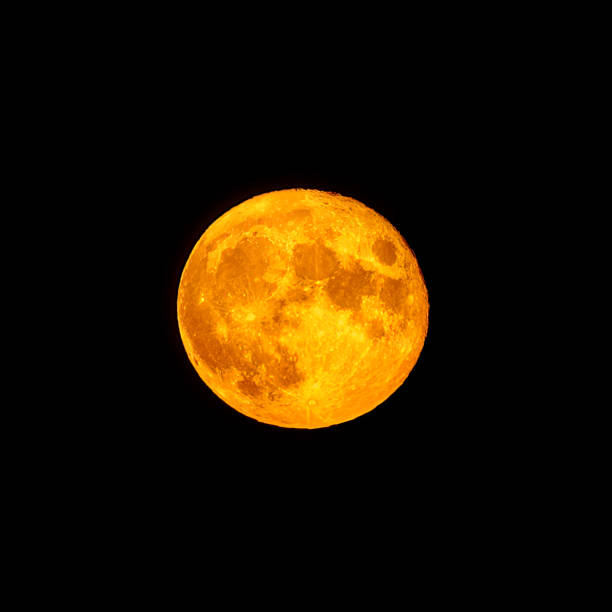 Red full moon in red color also called bloodmoon Bright orange and red fool moon over the sea. Red full moon in red color also called bloodmoon fool moon stock pictures, royalty-free photos & images