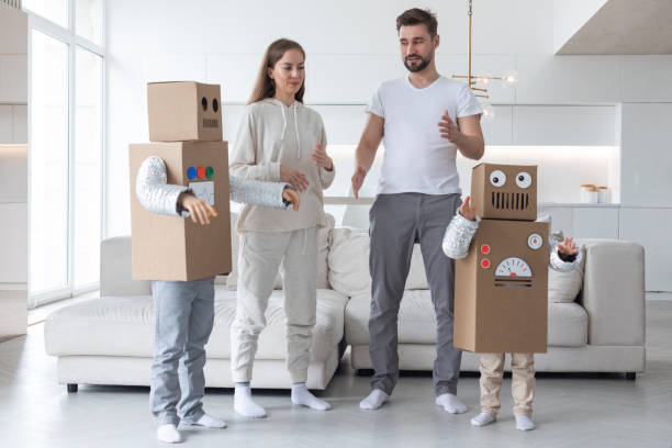 istock Family playing robots at home 1406770313