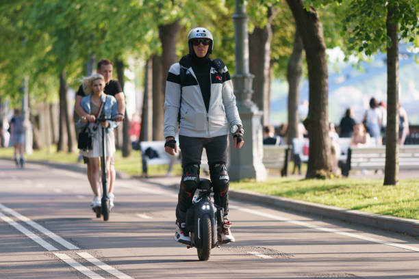 sport activity in the moscow public park - unicycle men young adult standing imagens e fotografias de stock