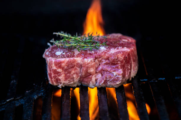 istock Beef Rib Eye Steak on a Hot Grill 1406782021