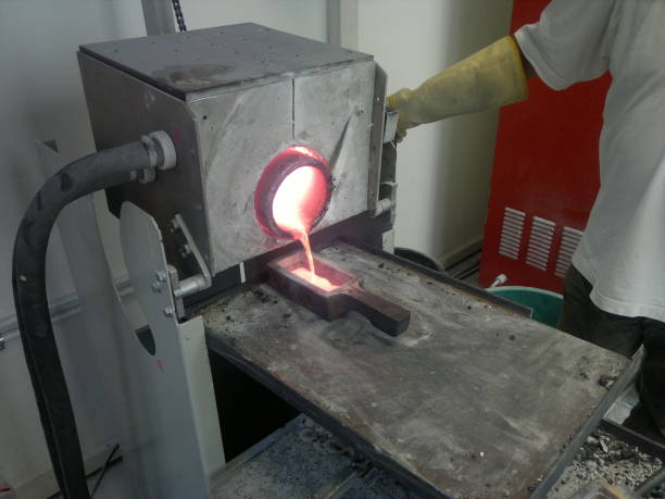 istock Melting gold in the shape of an ingot 1406783336