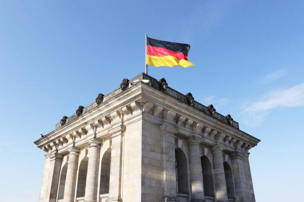 istock German flag over the Reichstag 1406788361
