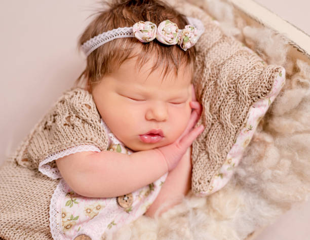 istock Cute little baby sweetly sleeping 1406792826