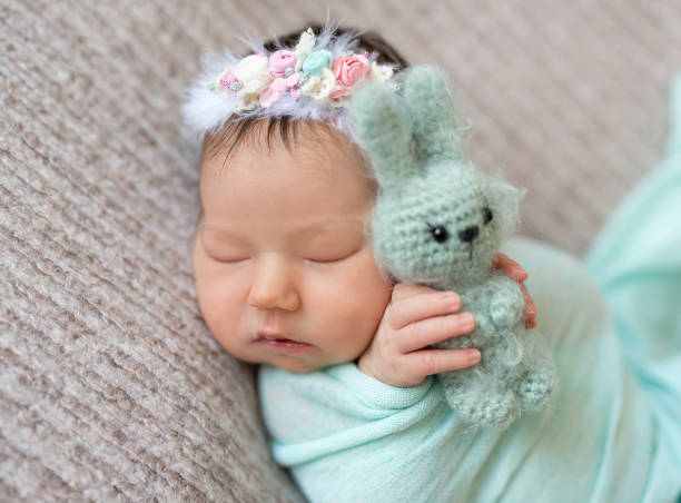 istock sleeping newborn baby girl 1406792924