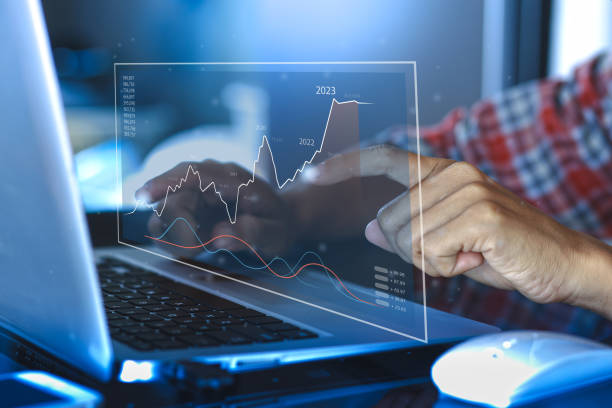 istock Businessman using a computer show plan business growth and financial, increase of positive indicators to increase business growth and an increase for growing up business from year 2013-2023 1406806798