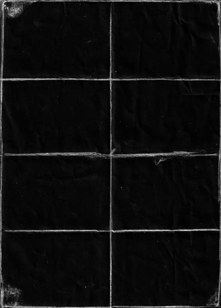 istock Folded paper with grungy texture in black background. 1406807432