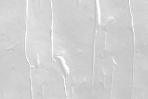 istock white crumpled and creased plastic poster texture background 1406812631