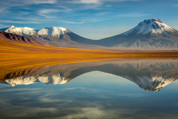 Lejia lake reflection at sunrise, near Atacama Volcanoes, Chile Laguna Lej a is a salt lake located in the Altiplano of the Antofagasta Region of northern Chile chile stock pictures, royalty-free photos & images