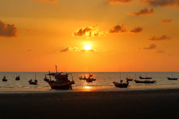 istock fishing boat in the sea 1406816678