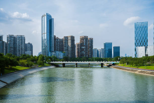 istock Riverside bridge and modern urban architecture in sunny days 1406817732