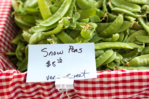 Baskets of Fresh Sweet Peas for Sale in a Road Side Farmer's Market