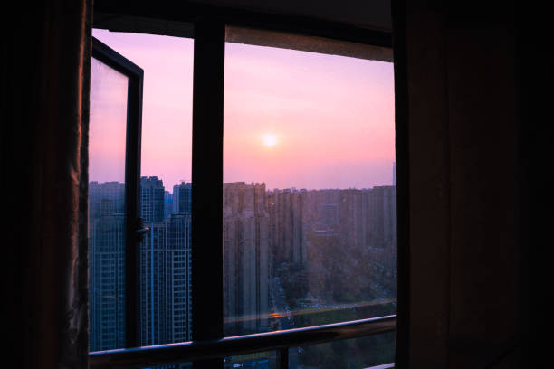 istock The city scenery outside the sunset window 1406818787