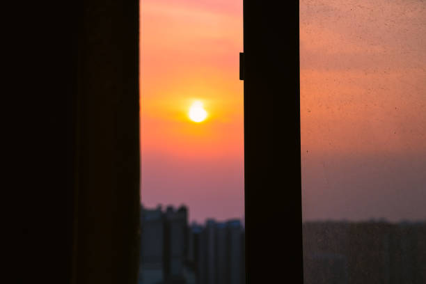 istock The city scenery outside the sunset window 1406818793