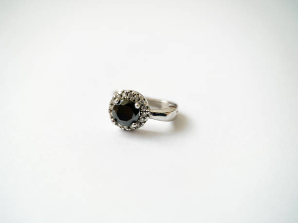 istock Silver earrings with black zircon close-up 1406819735