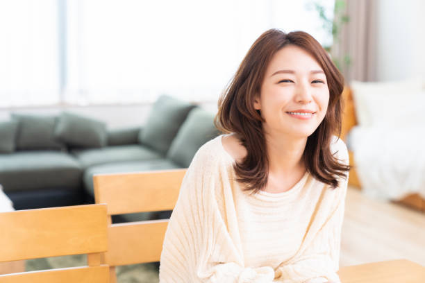 istock attractive asian woman relaxing 1406823067