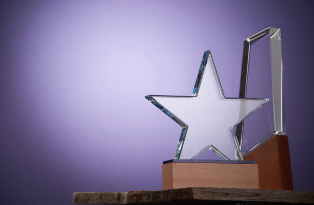 istock crystal trophy against purple background 1406824251
