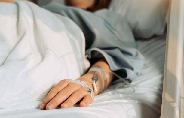 Asian woman lying sick in hospital. Asian woman lying sick in hospital. sick woman hospital bed stock pictures, royalty-free photos & images