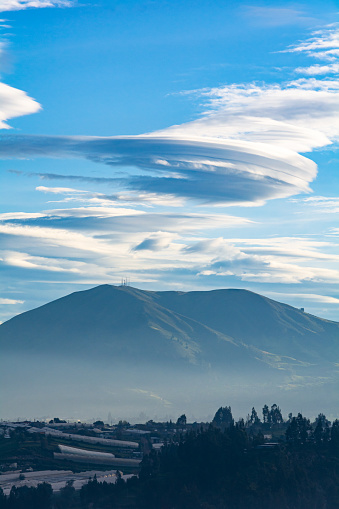 Lenticular clouds over the mountains