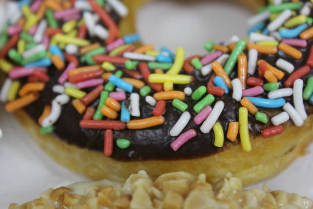 istock Close up of colorful donuts 1406831438