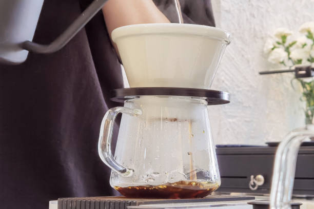 istock Pour hot water over the coffee powder 1406836780