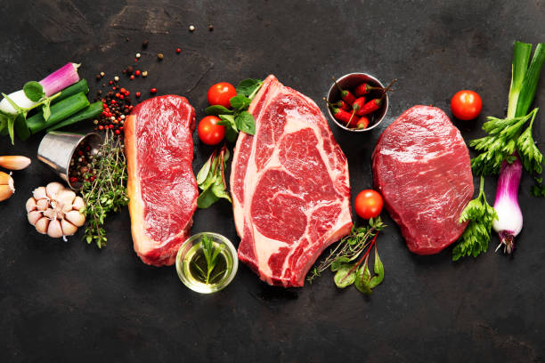 istock Variety of raw beef meat steaks for grilling. 1406837039