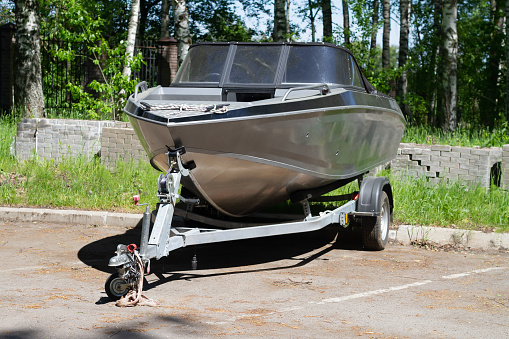 Summer scene with motorboats moored in marina in Mikolajki, the largest sailing resort in Poland