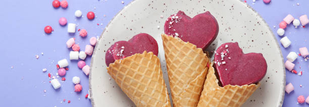 istock Violet blueberry ice-cream on lilac background. 1406837315