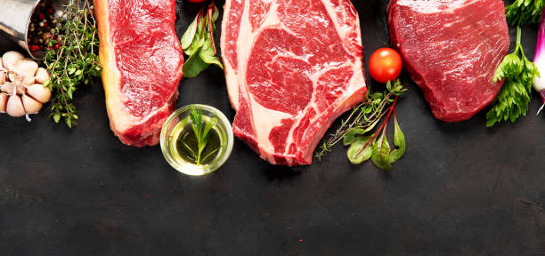 istock Variety of raw beef meat steaks for grilling. 1406837318