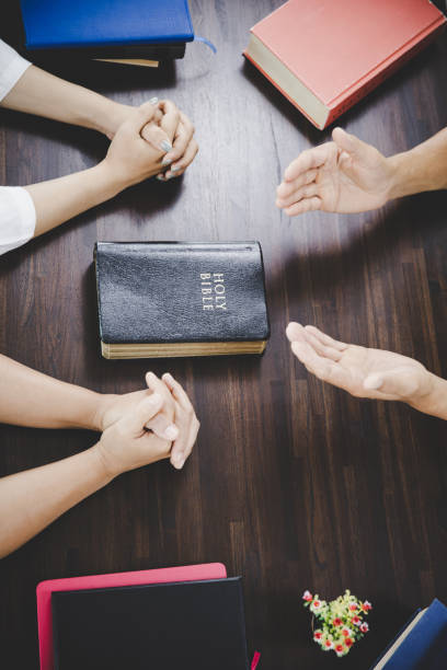 Group of people praying worship believe